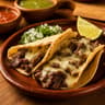 TACO DE BISTEC CON QUESO
