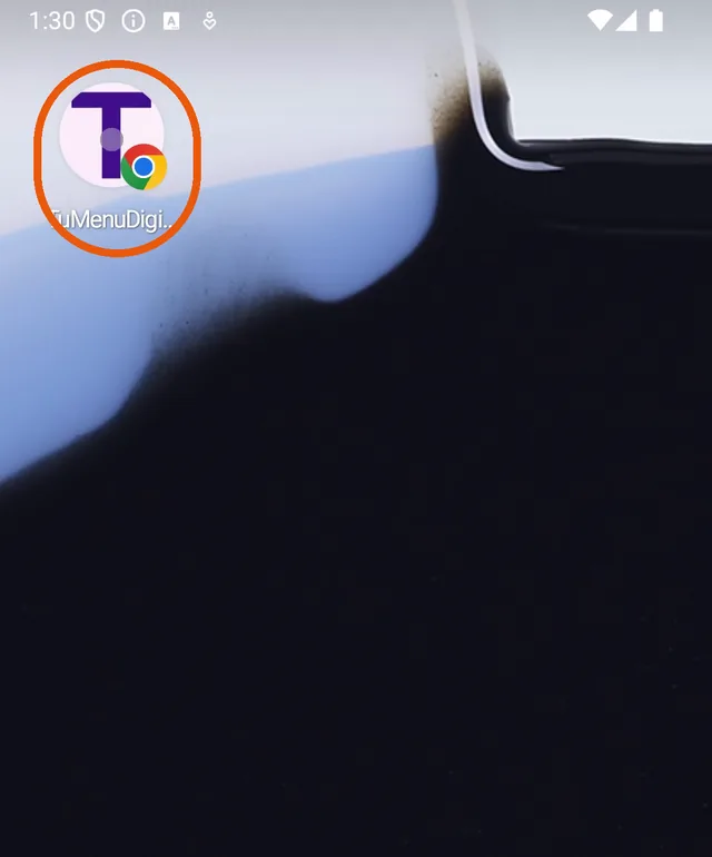 Pantalla de inicio de Android con el ícono de TuMenuDigital marcado